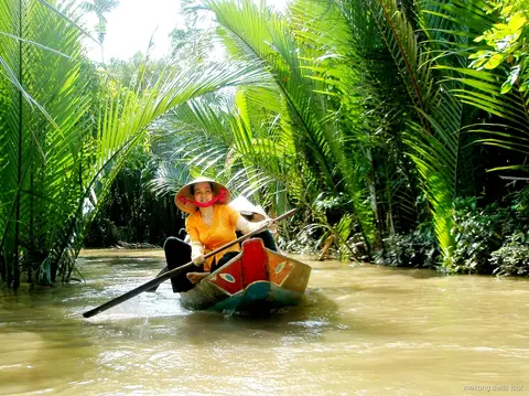 Motorboat cruise on the Mekong River during a Mekong Delta day tour from Ho Chi Minh City